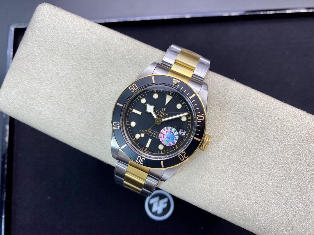 HERITAGE BLACK BAY 41MM GOLD STEEL BLACK DIAL