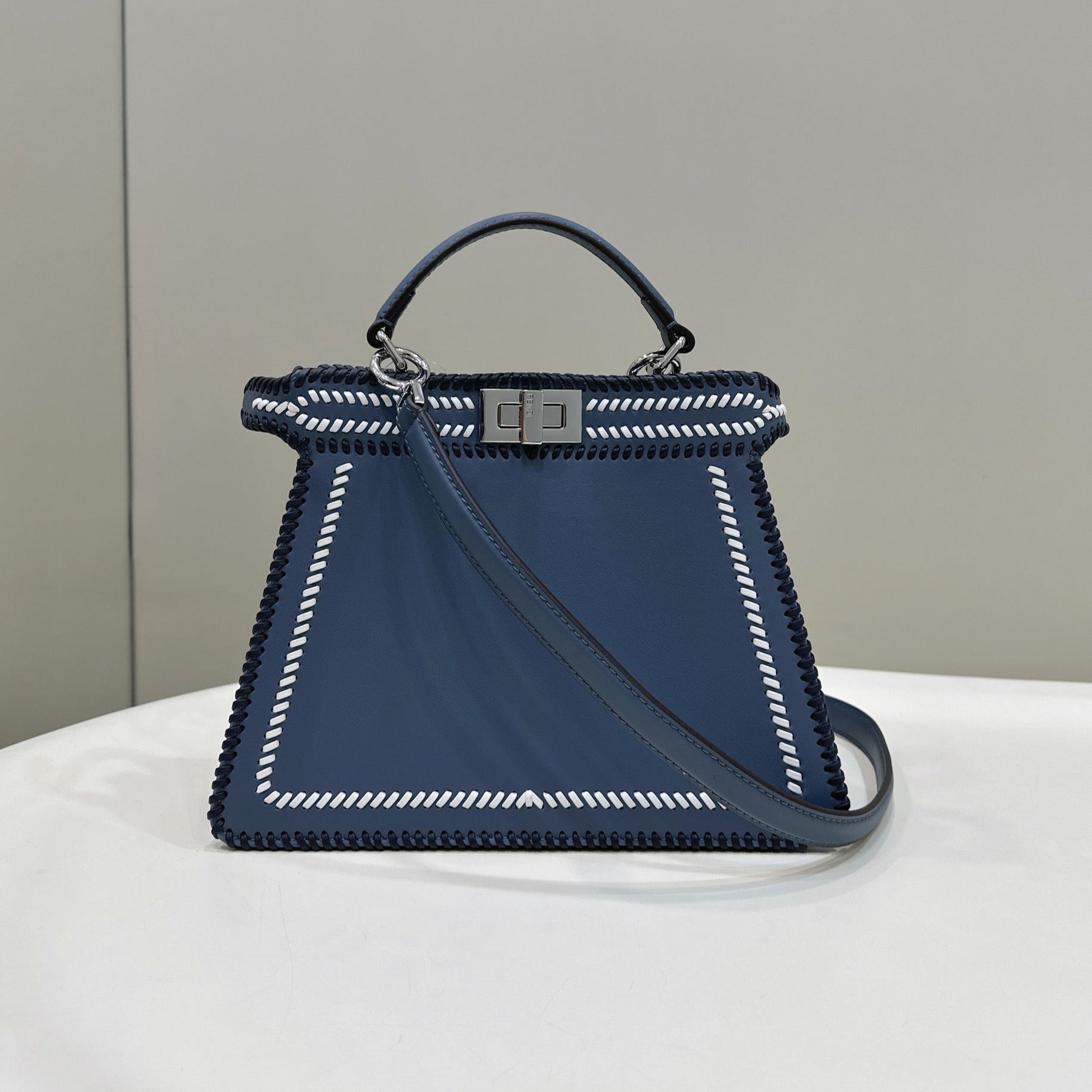 PEEKABOO ISEEU 27 IN BLUE BAYOUX INTERLACED CALFSKIN SILVER HARDWARE