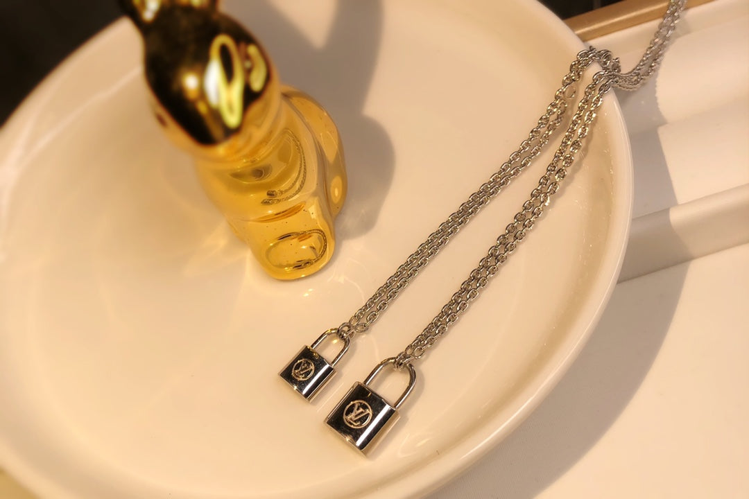 LV CHARITY LOCK NECKLACE