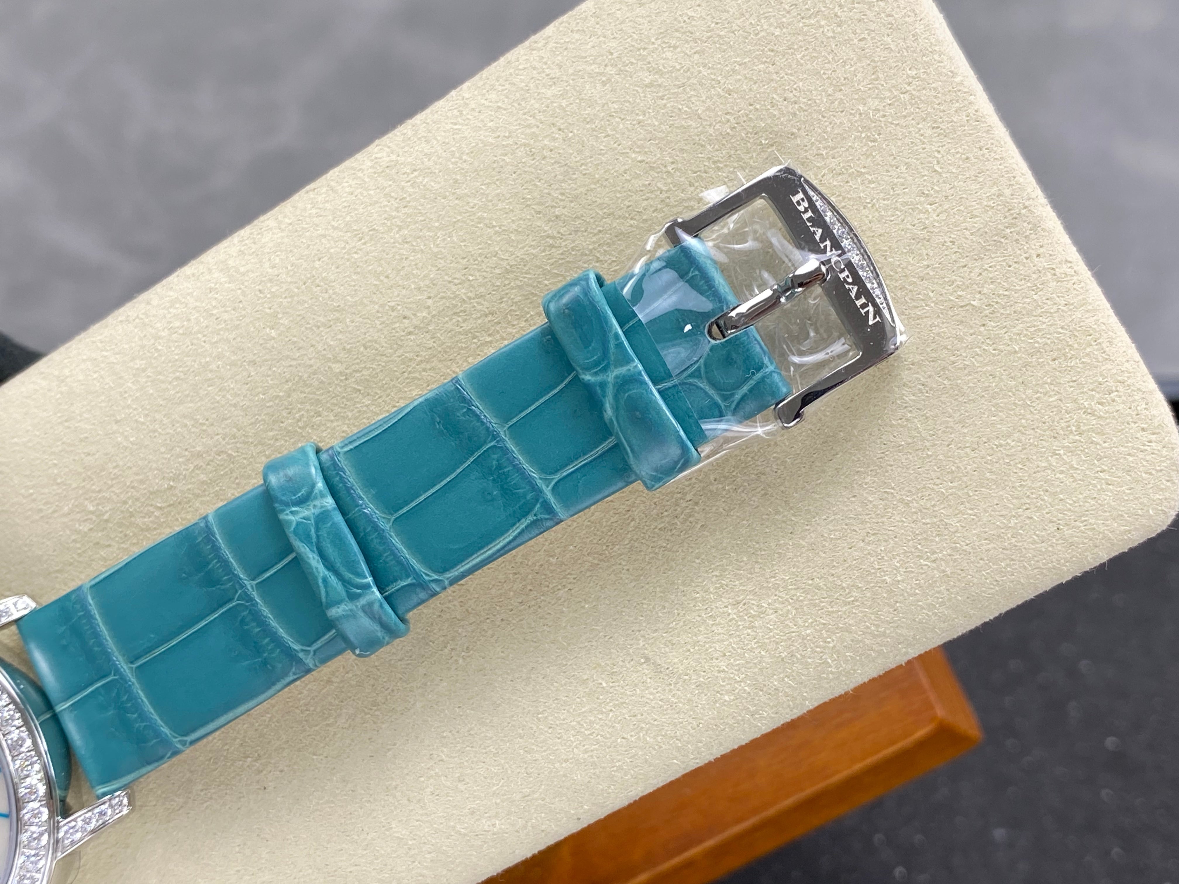 Blancpain's Ladybird 35mm White Blue Dial Diamond Bezel Crocodile Leather
