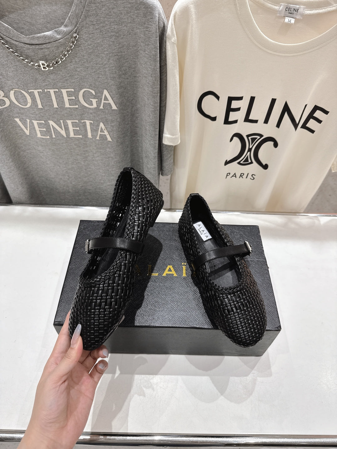 ALAIA MARY JANE FLATS black woven calfskin pattent