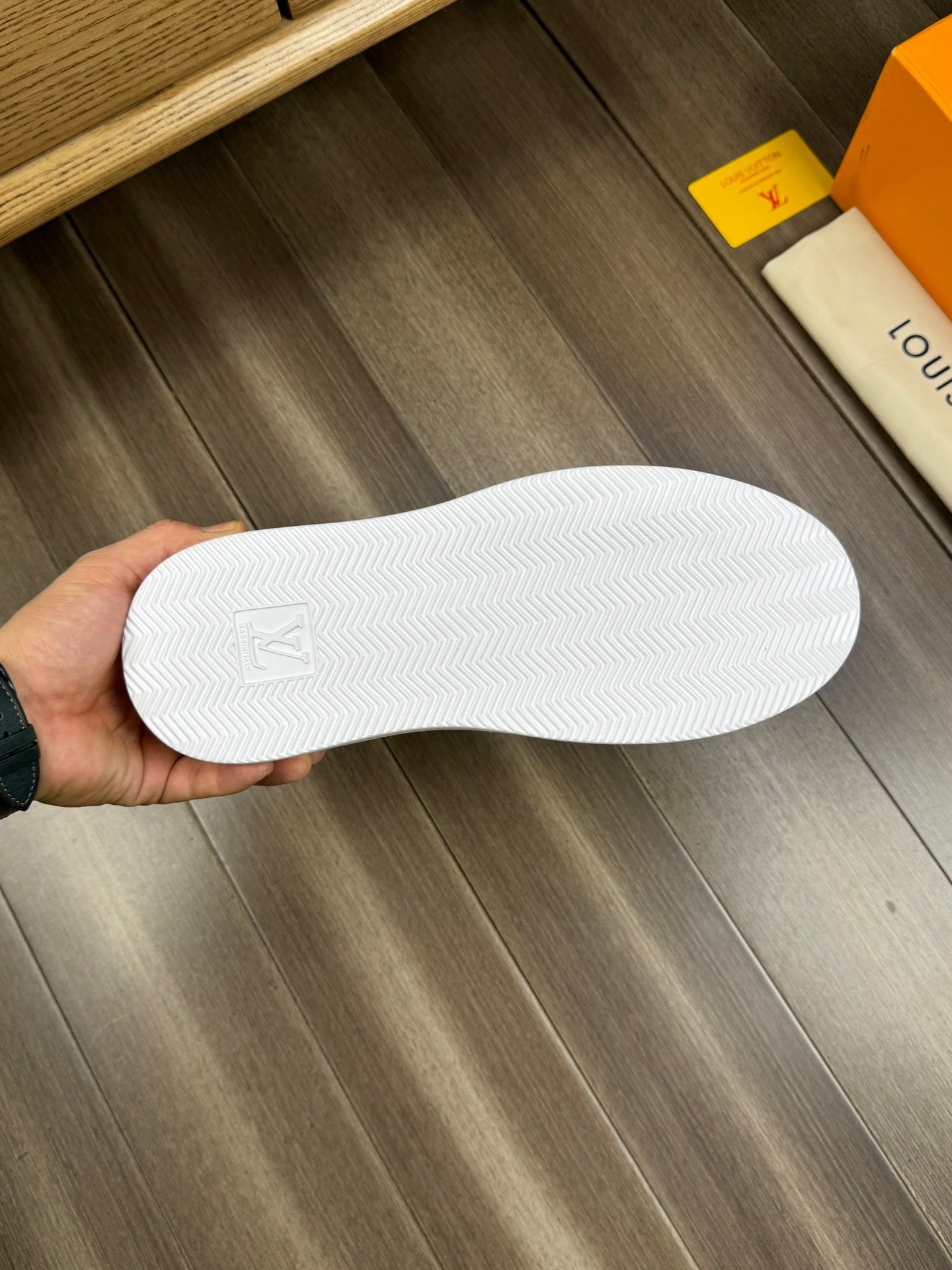 LV TRAINER SNEAKER WHITE AND BLACK CALFSKIN AND BREATHABLE FABRIC