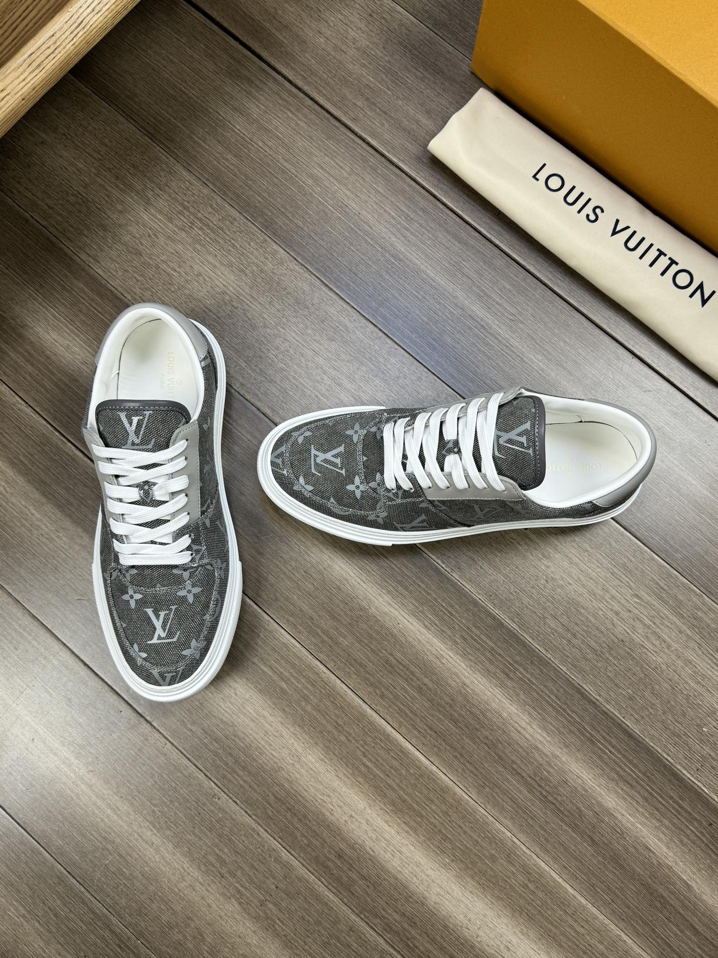 LV TRAINER SNEAKER IN ASH GREY MONOGRAM DENIM