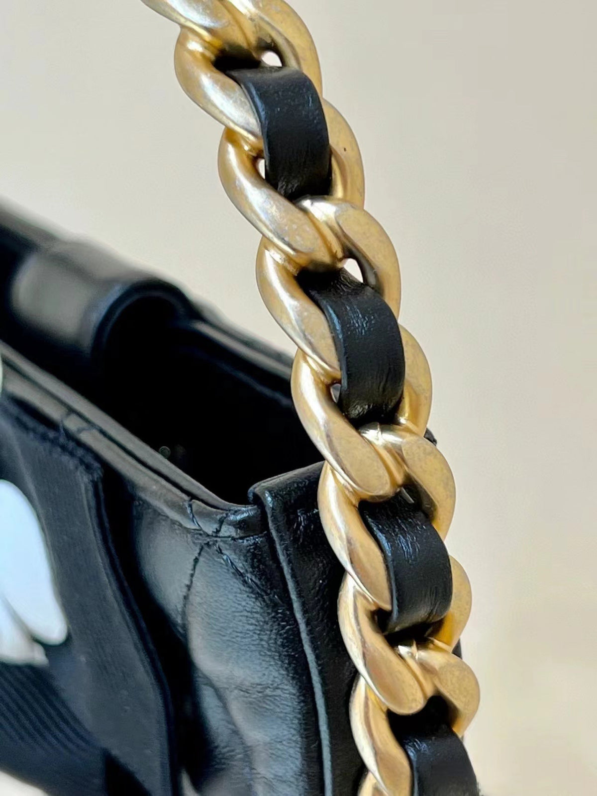 Chanel 2026 Quilted Round Camellia Mini Clutch 16cm Lambskin