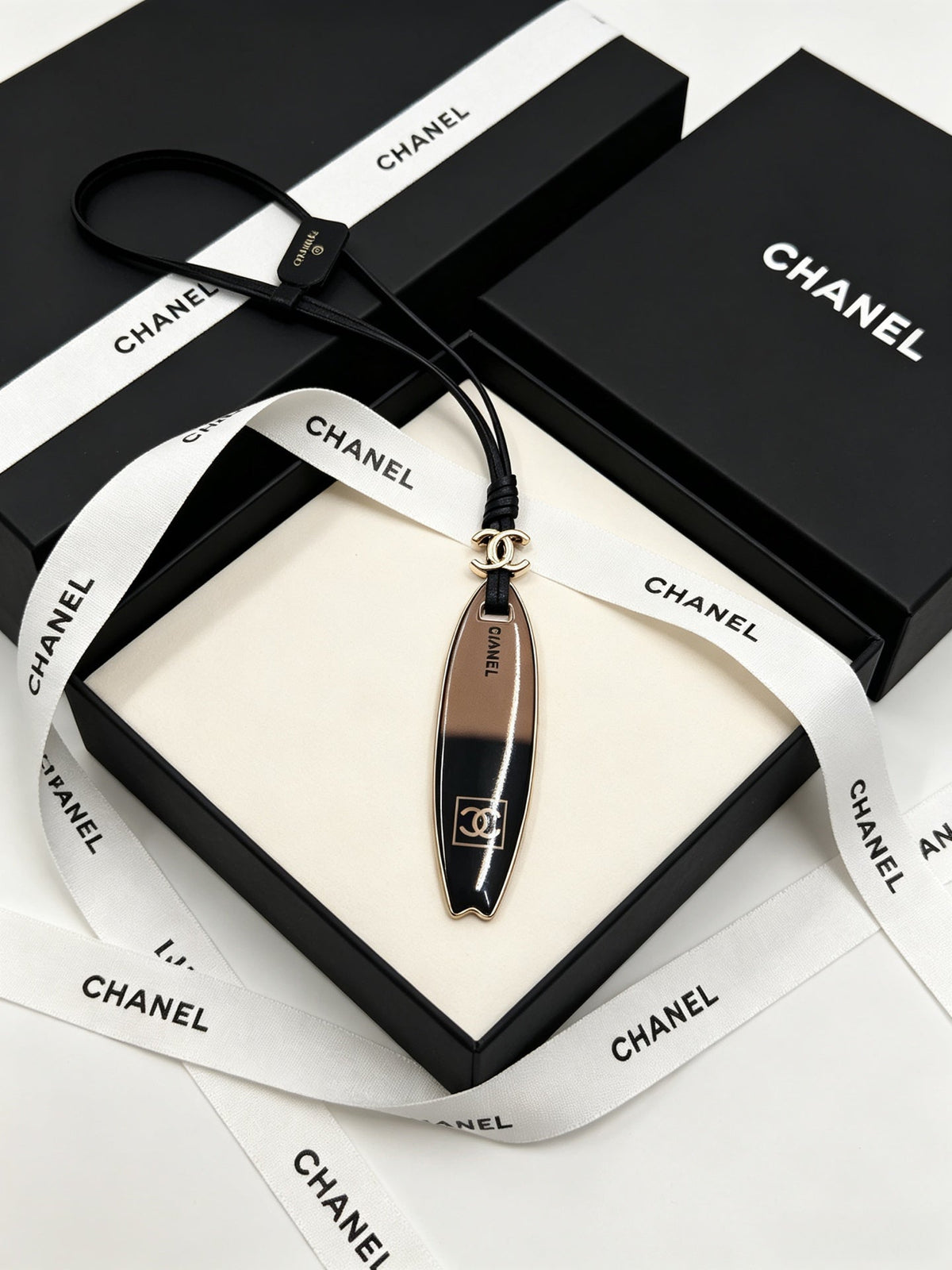 Chanel Surfboard-shaped Leather Cord Charm