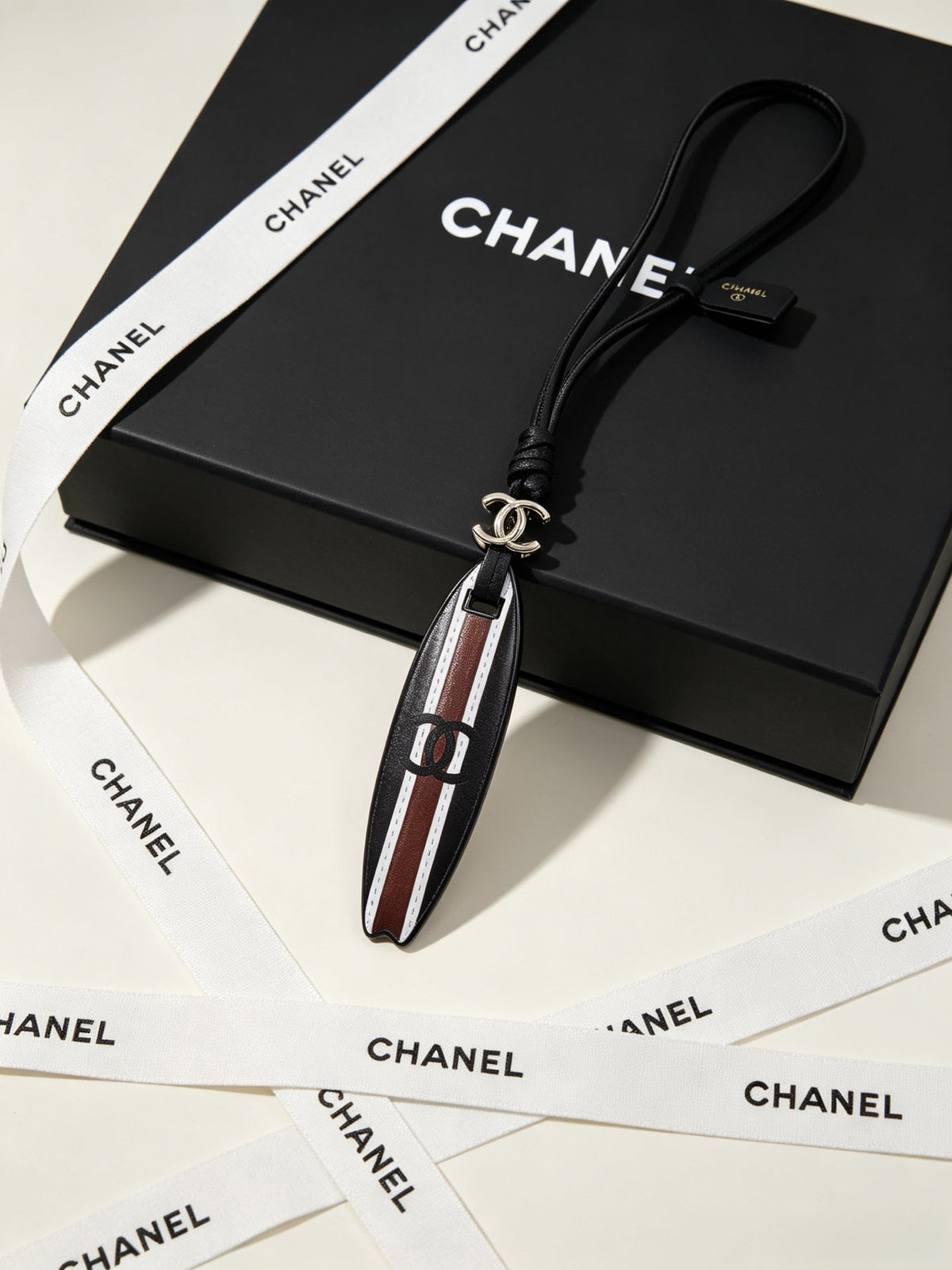 Chanel Surfboard-shaped Leather Cord Charm