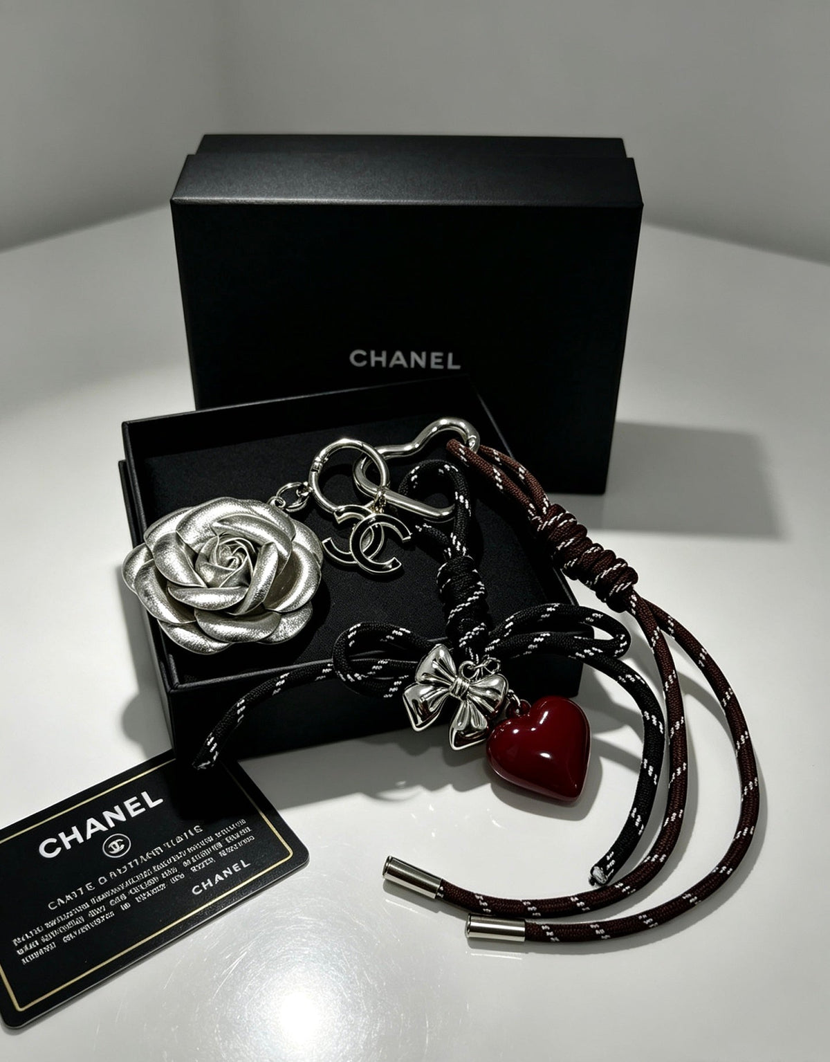 Chanel Silver Flower Charm