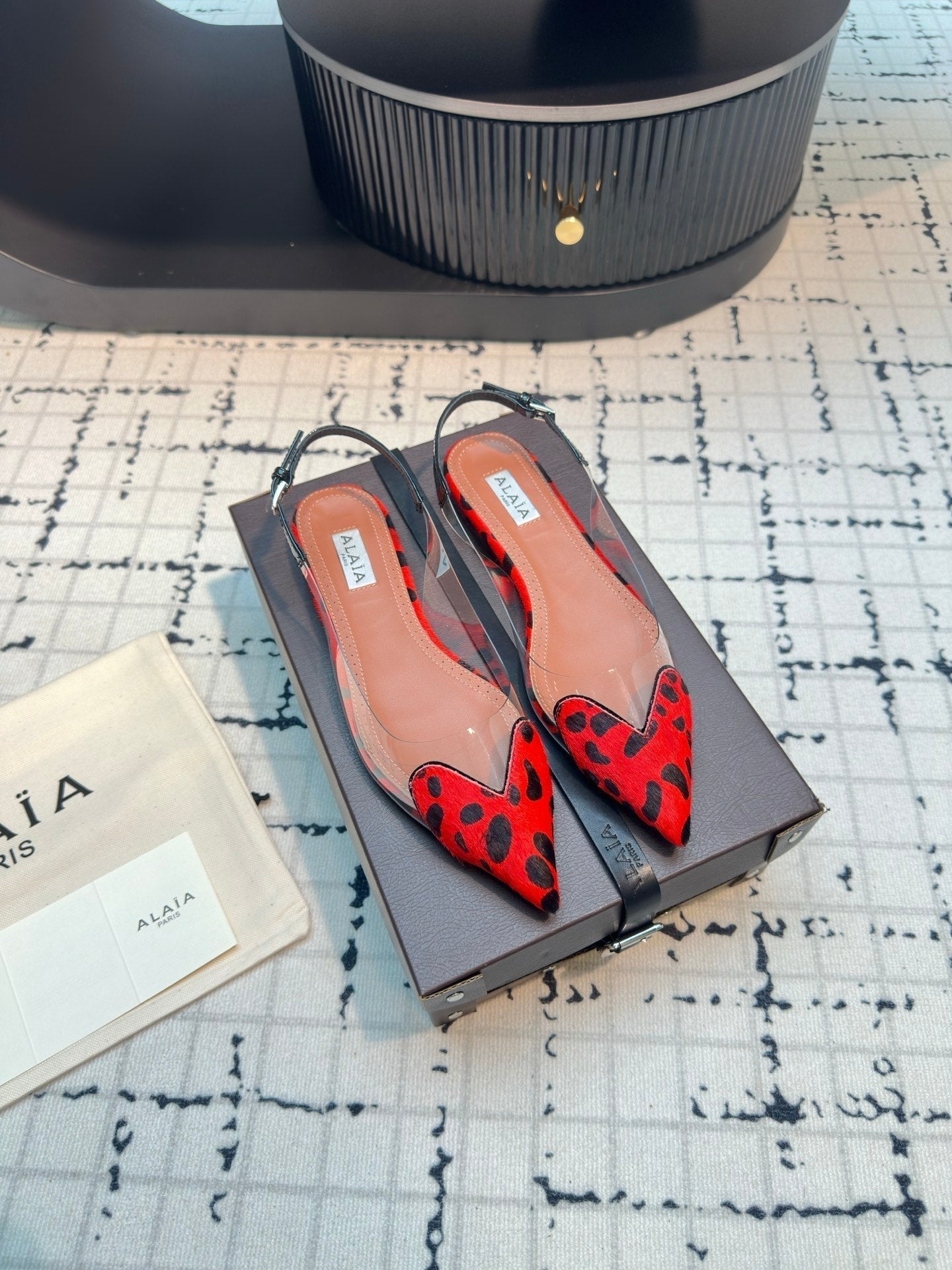 ALAIA FLAT SLINGBACK IN CHERRY RED MIX BLACK PATENT CALFSKIN AND FILM