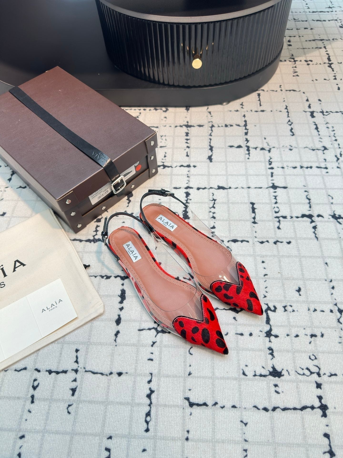 ALAIA FLAT SLINGBACK IN CHERRY RED MIX BLACK PATENT CALFSKIN AND FILM