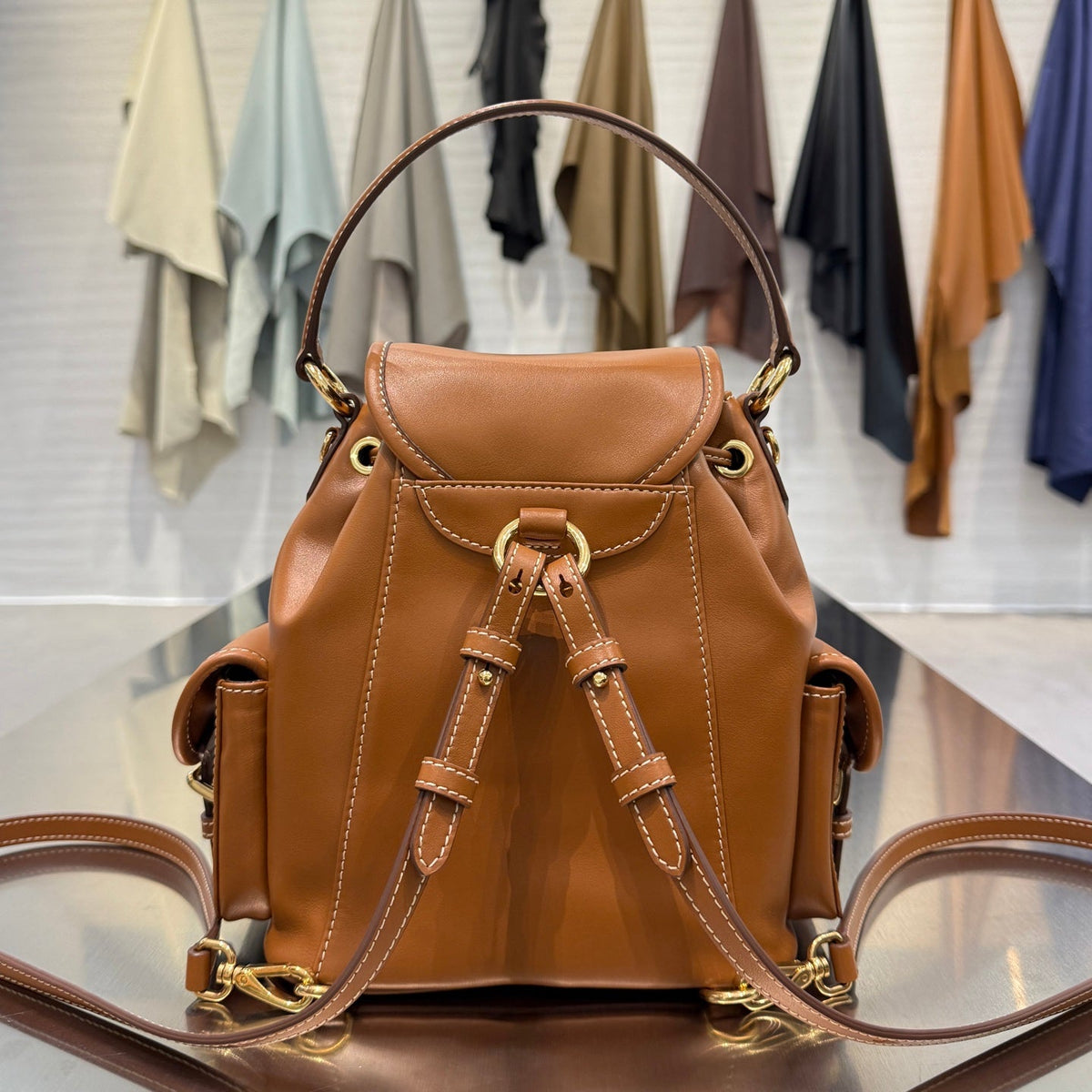 MiuMiu 2026 Buckle Gold Backpack Leather