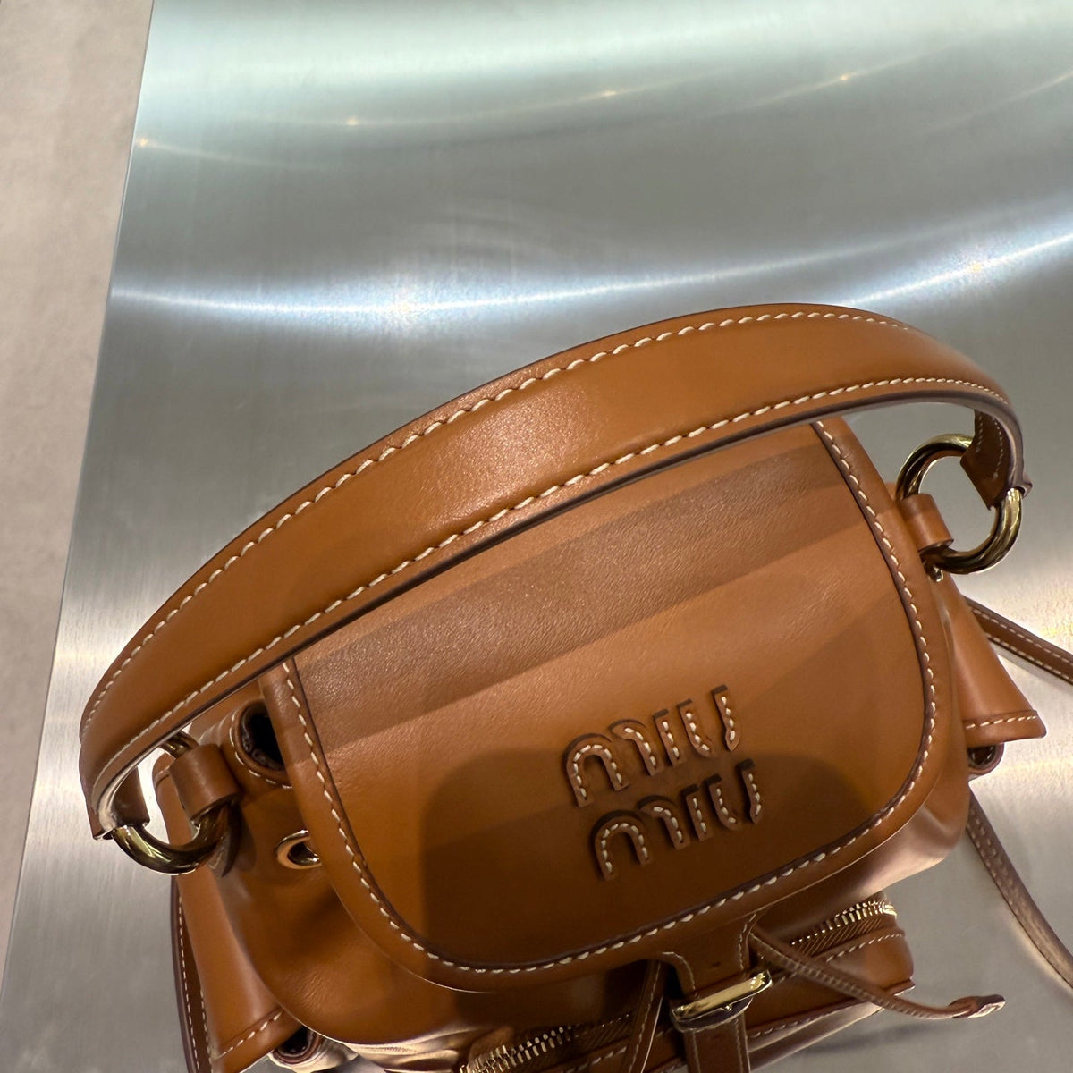 MiuMiu 2026 Buckle Gold Backpack Leather