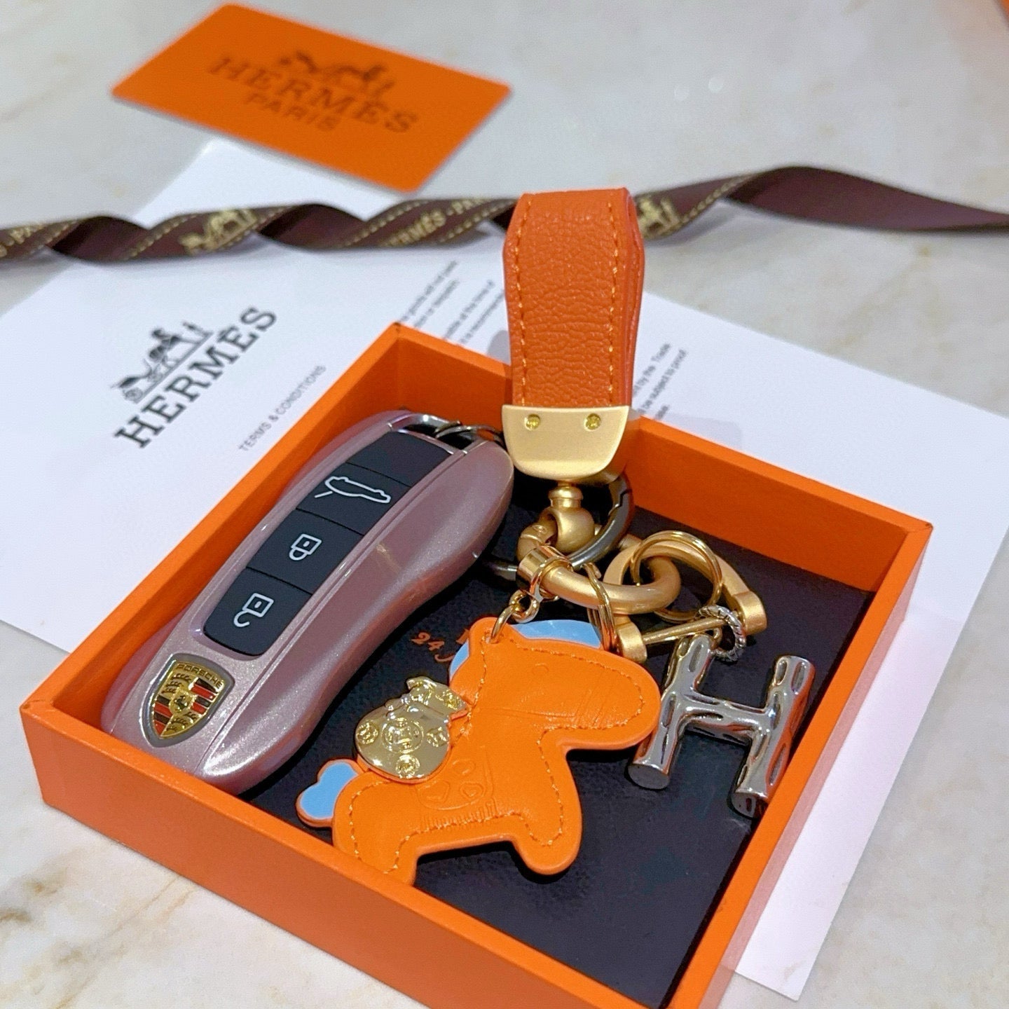 HM Rodeo Pegase Bag Charm Orange Lambskin