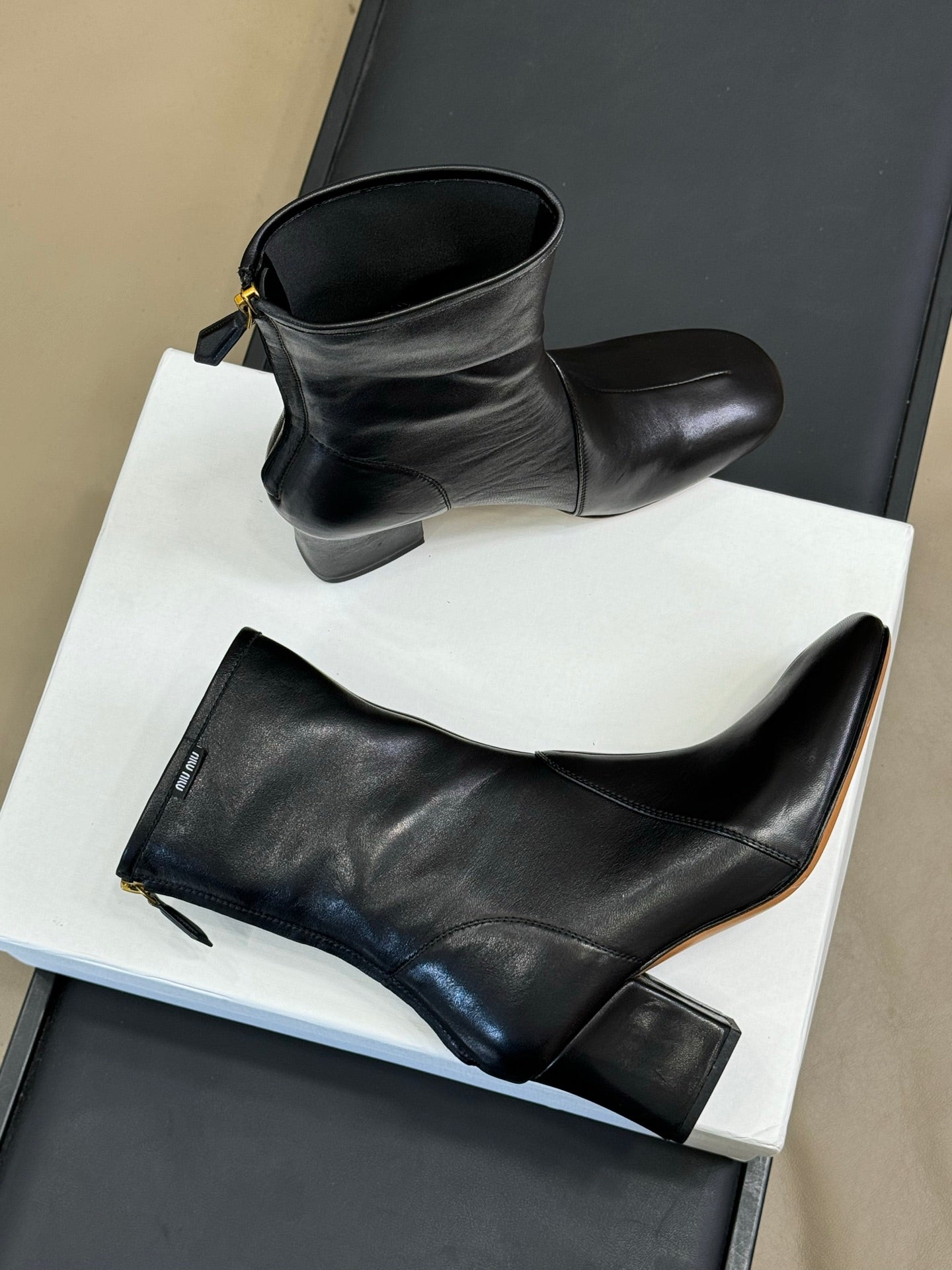 MiuMiu ankle boots black  cowhide 521946