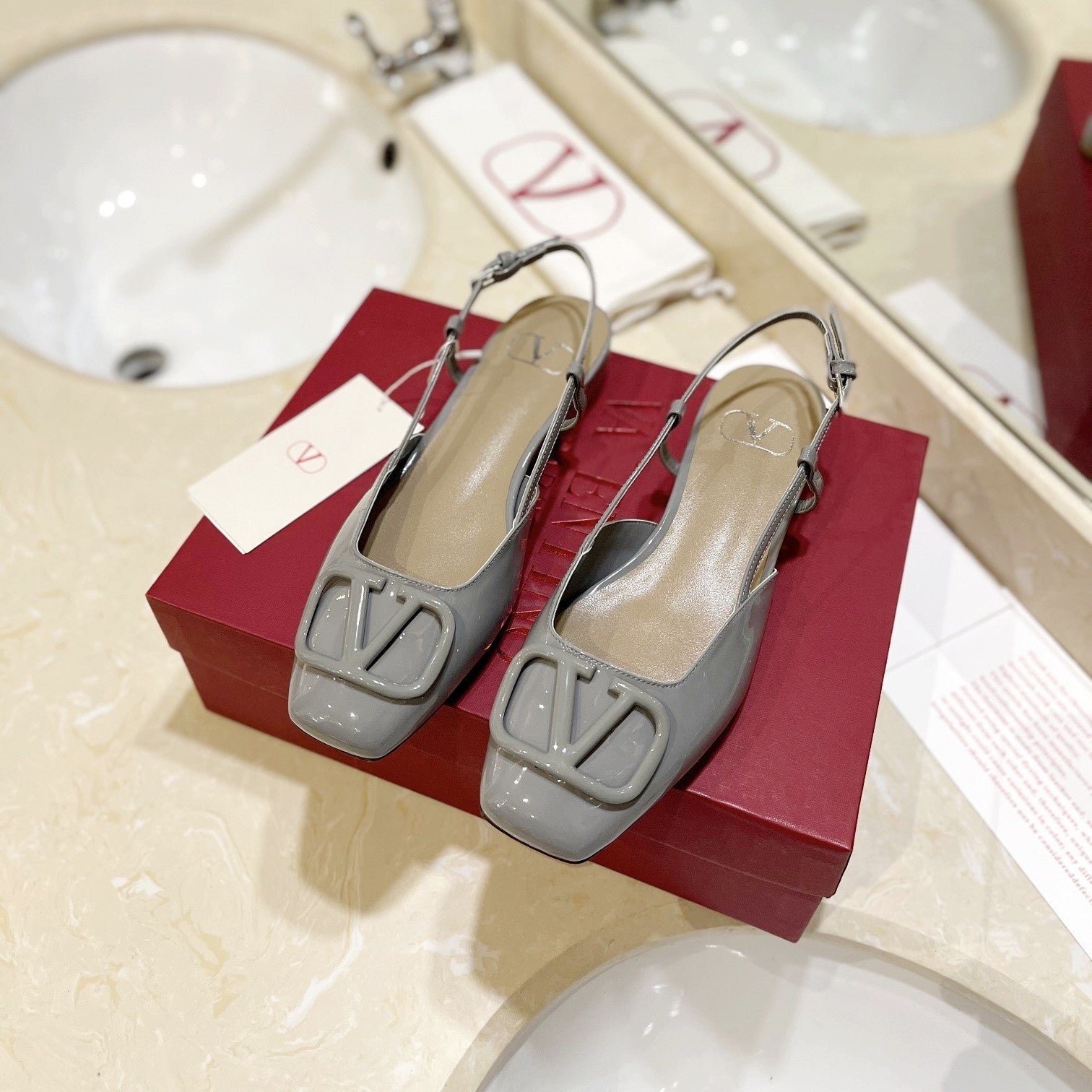 VLOGO GREY PATENT LEATHER SLINGBACK FLATS